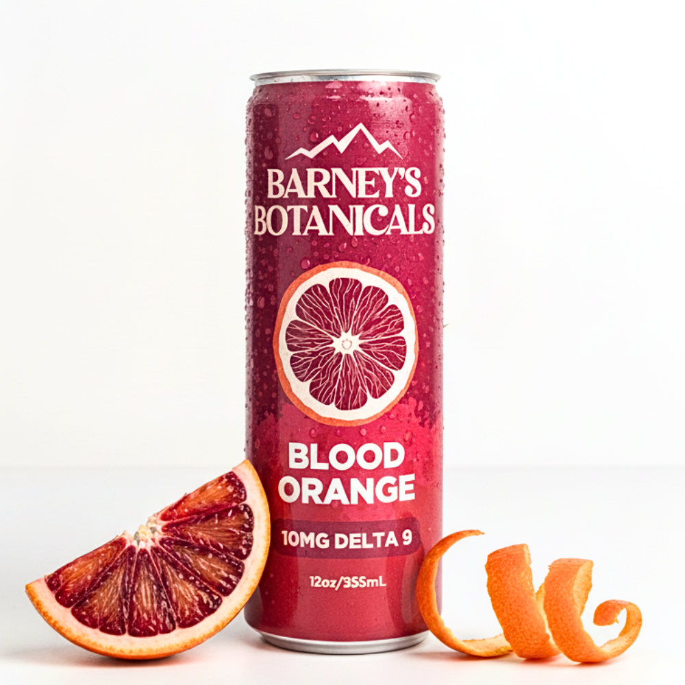 Barney's Botanicals Blood Orange drink can with blood orange slices on a white background