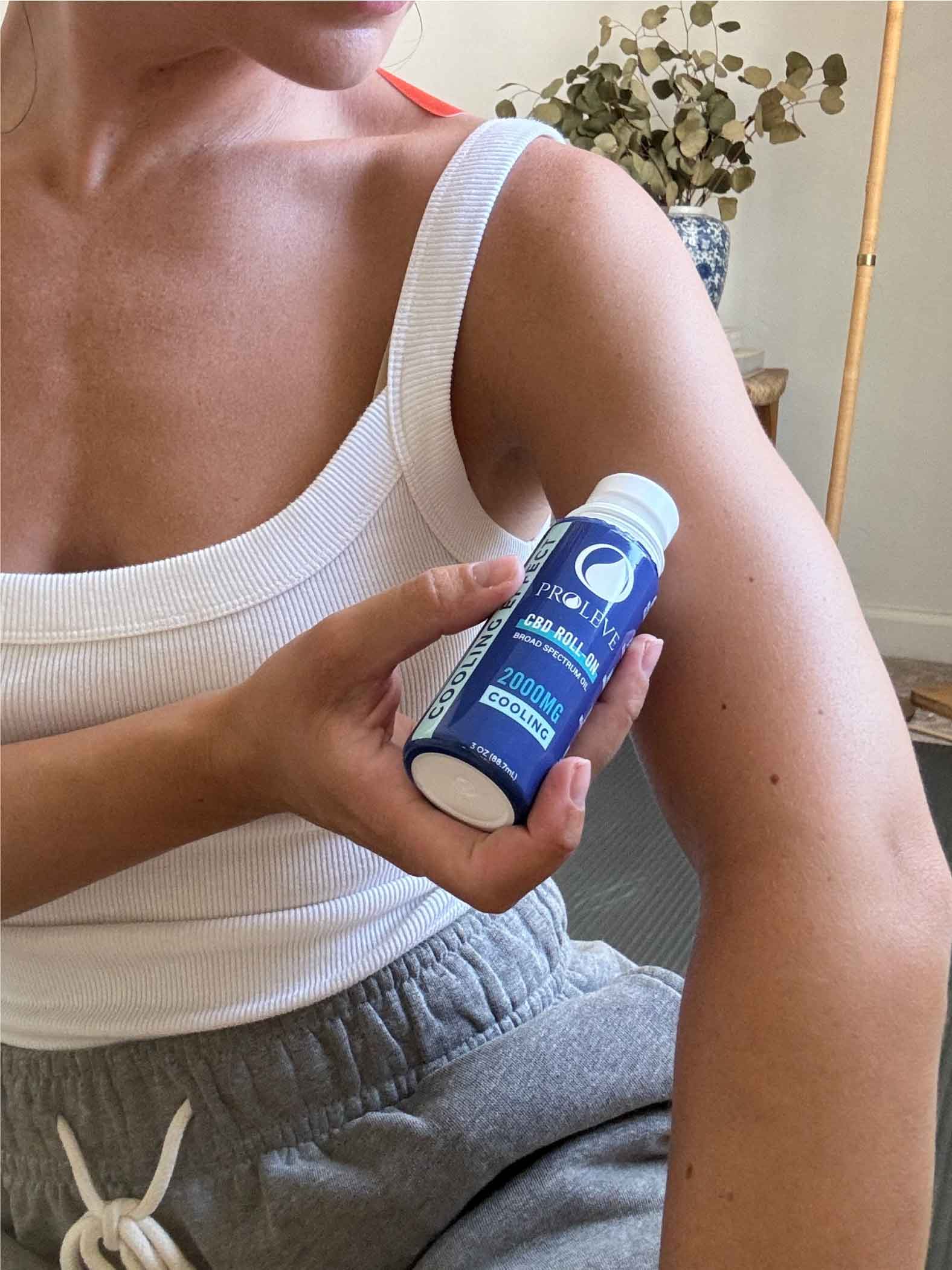 Image showing a woman applying Proleve's cooling roll on to her bicep